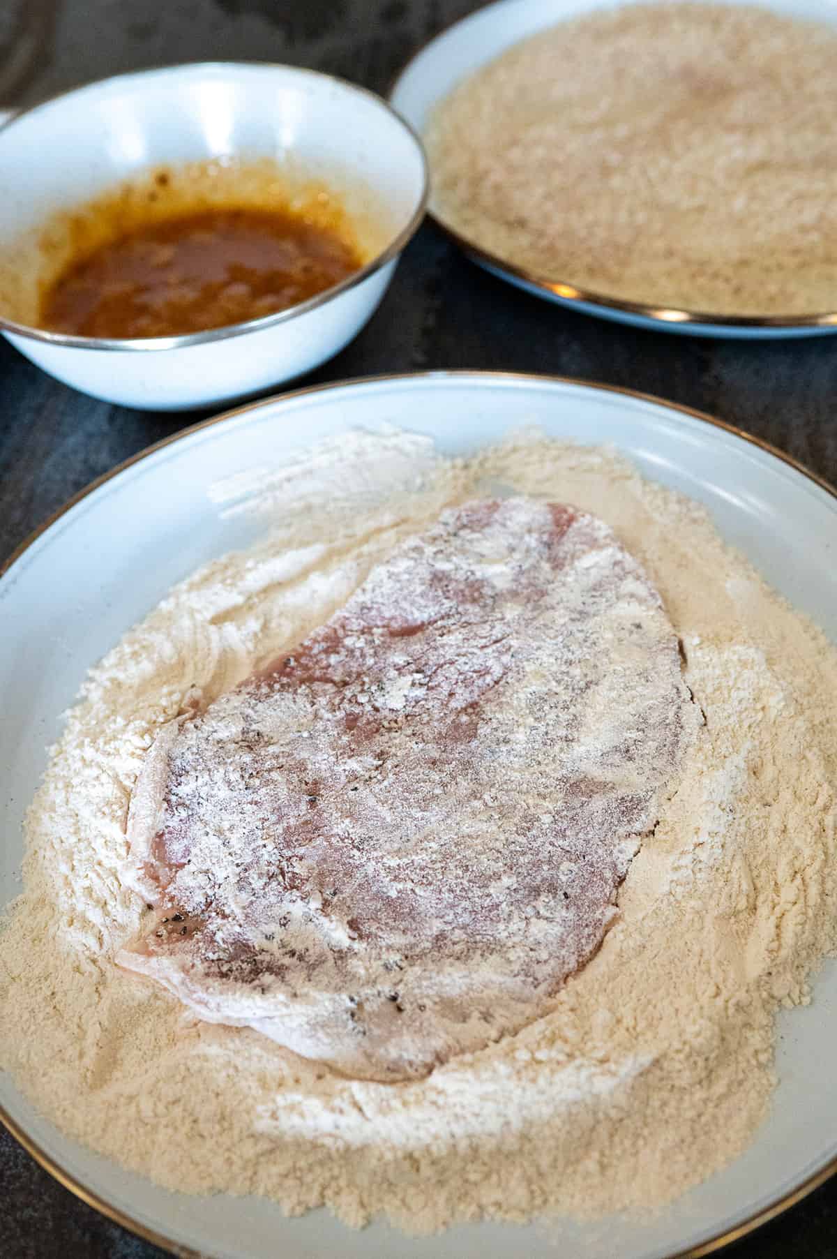 pork cutlet in flour.