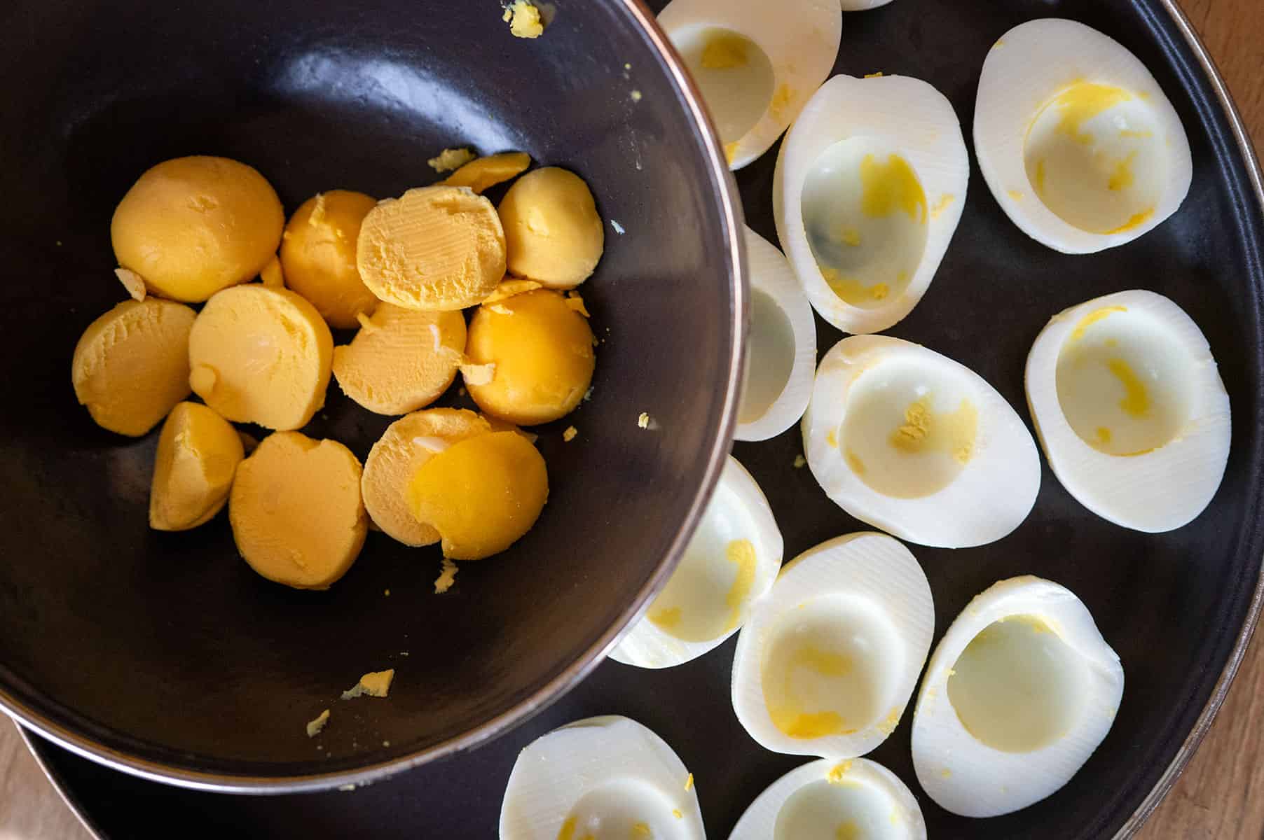 Hard boiled eggs halved, yolks removed.