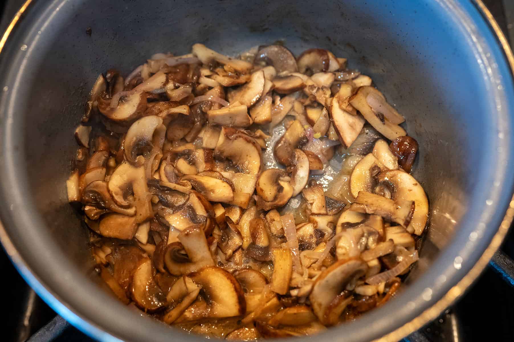 Sauteeing mushrooms.