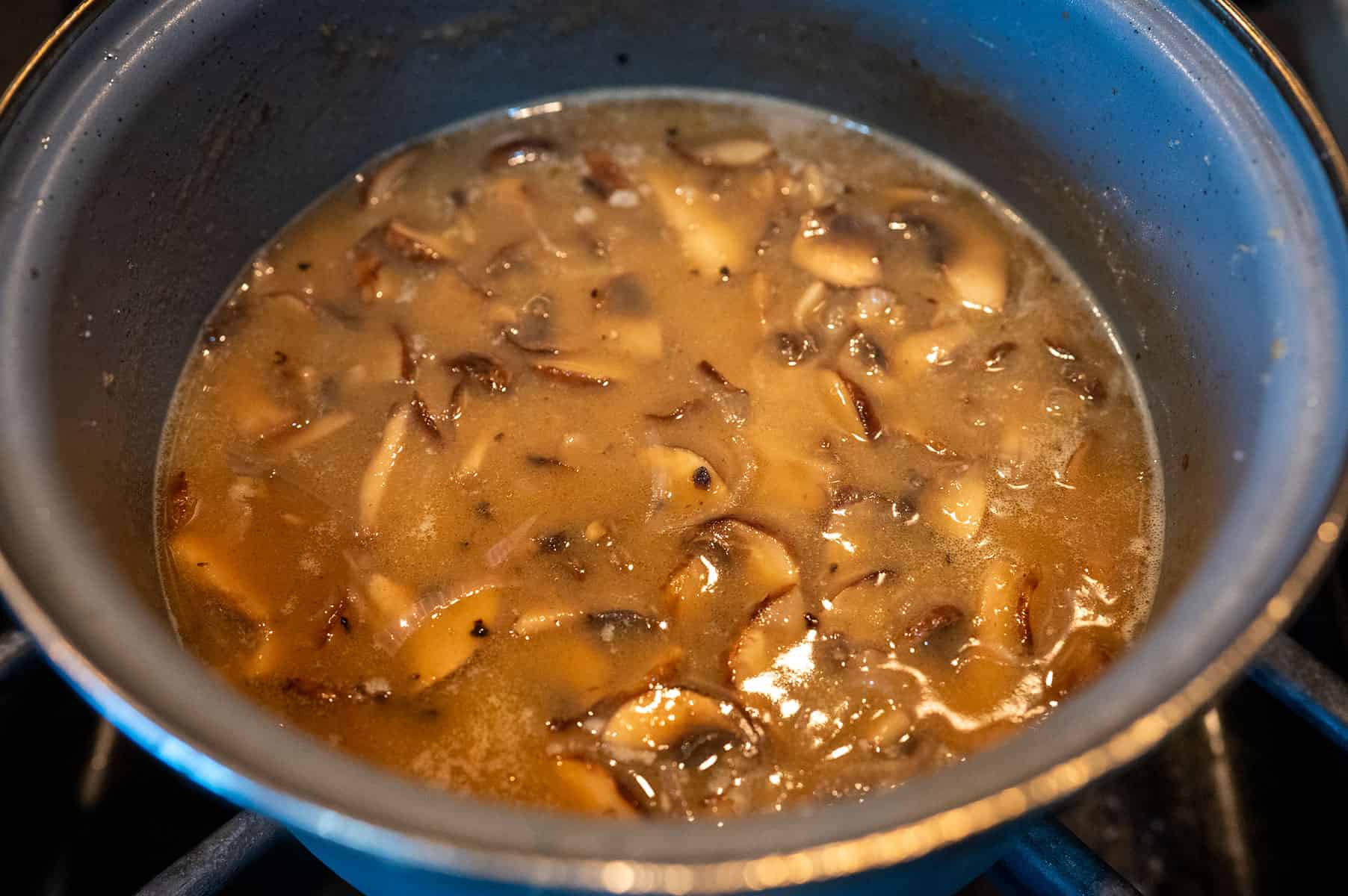 Simmering mushroom gravy.