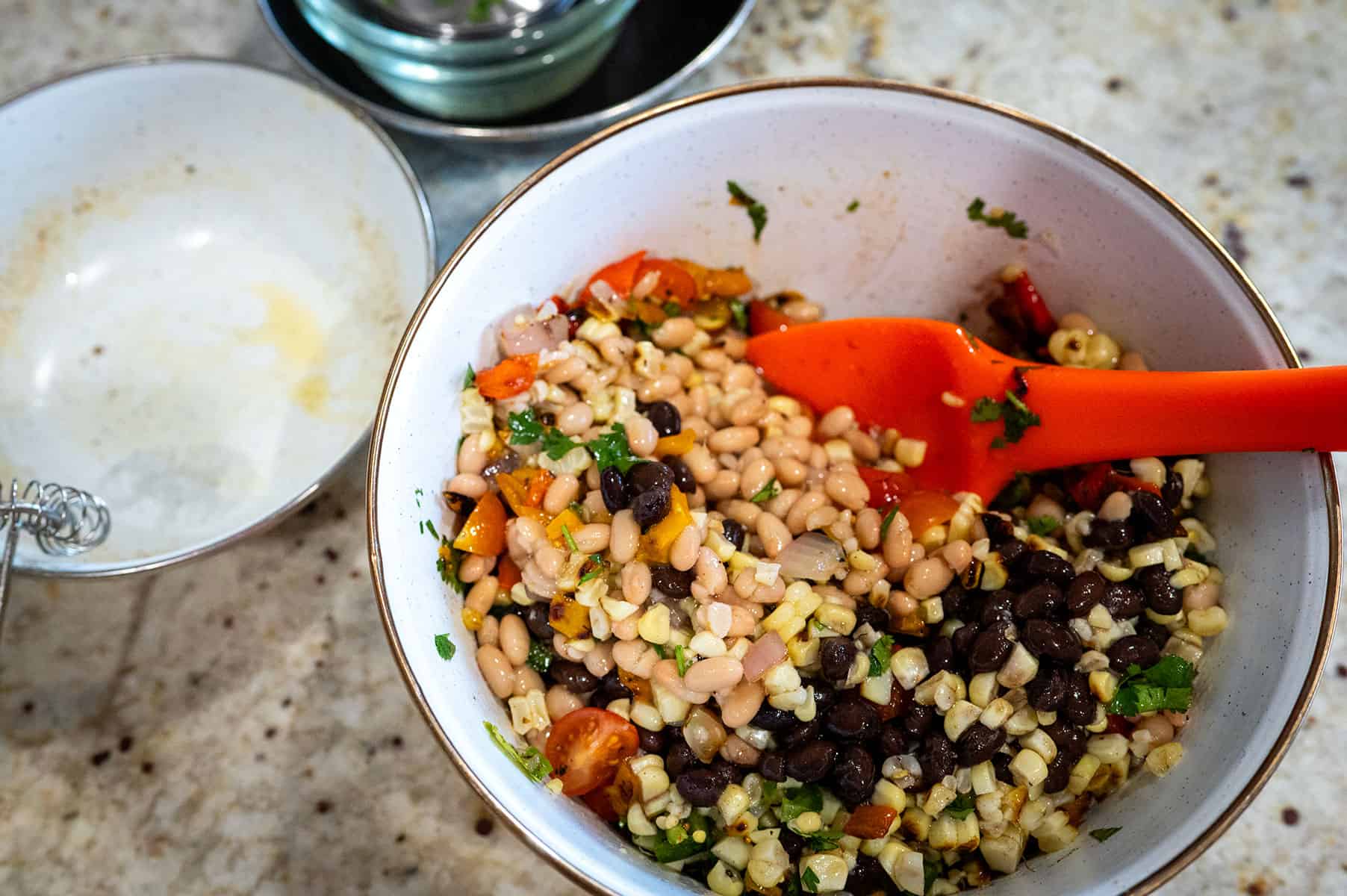 cowboy caviar ingredients in bowl ready to mix.